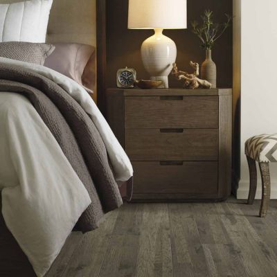 wood look laminate flooring in a cozy Cary bedroom