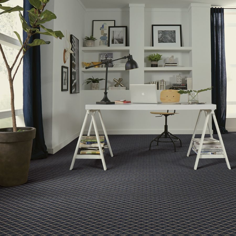 dark black navy geometric pattern carpet in office space with white desk